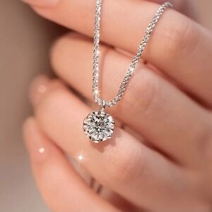 Stunning Moissanite Pendant On Stamped Sterling Silver Chain.